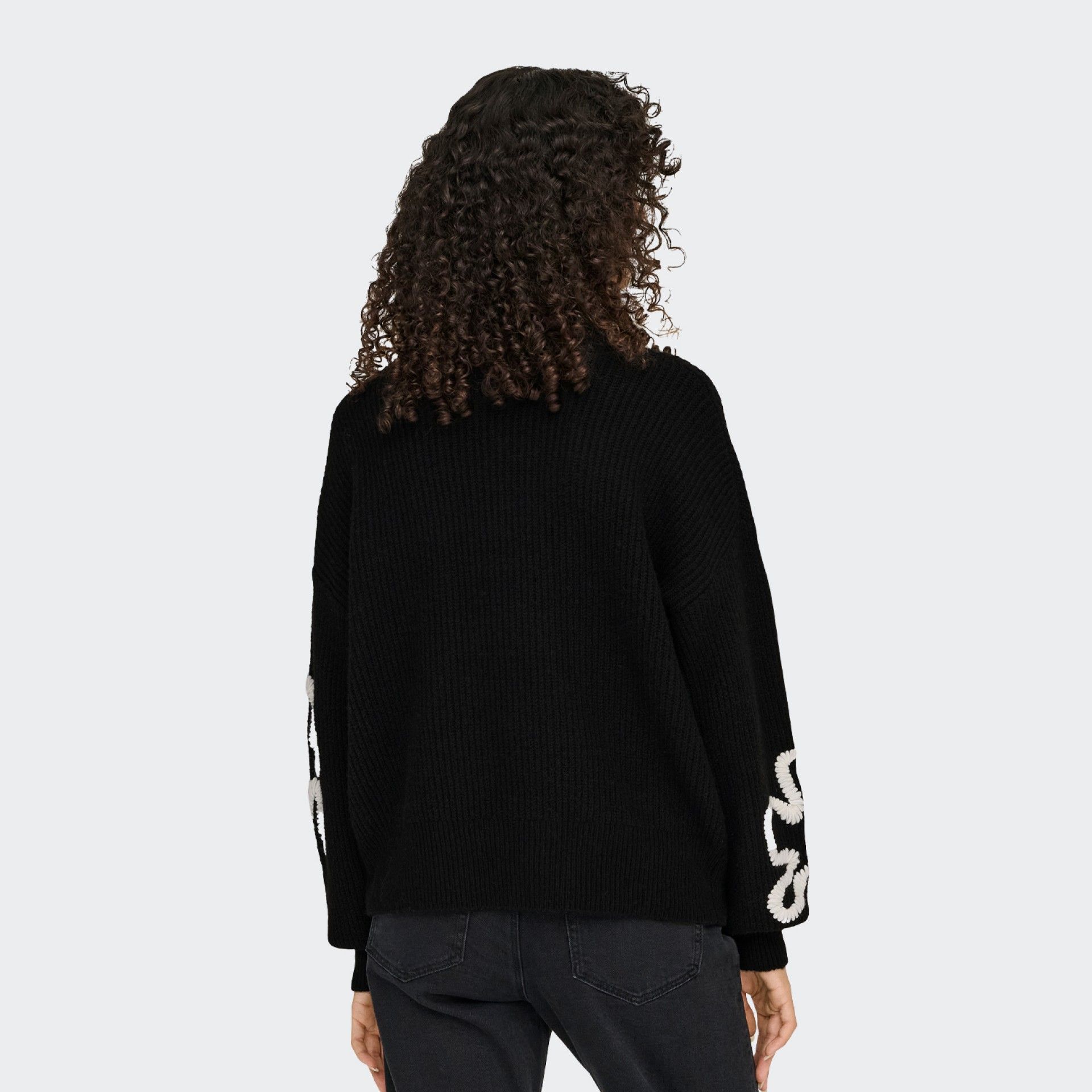 Pull en tricot fleuri uniquement